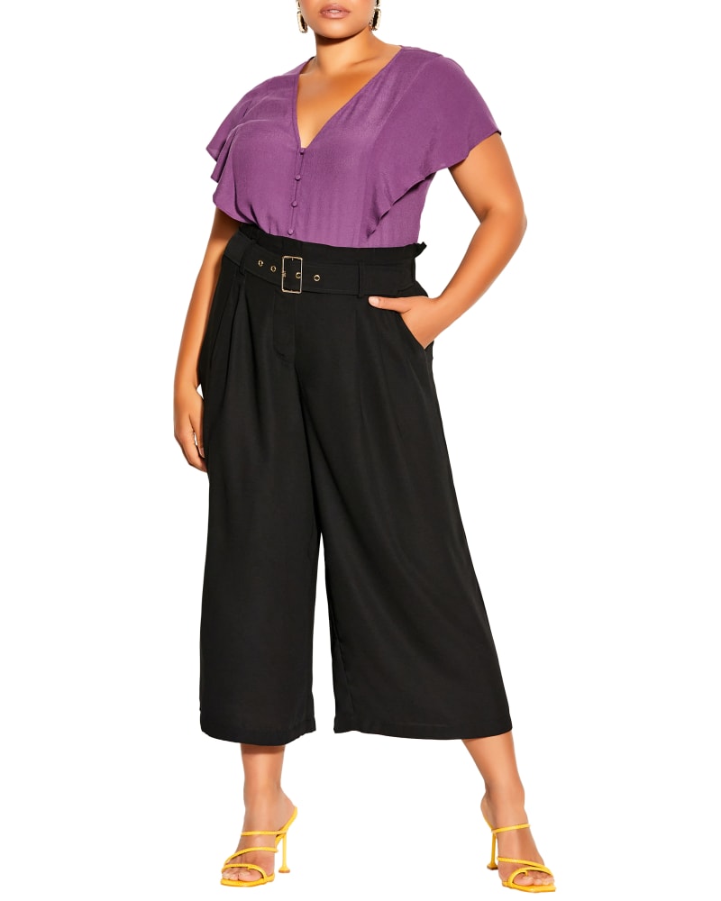 Front of a model wearing a size XL Easy Crop Pant in Black by City Chic. | dia_product_style_image_id:297866